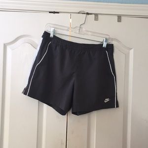 Gray Nike shorts with front pockets